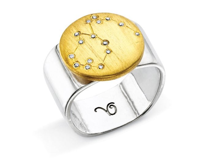 Ring of 22k gold disc atop a sterling silver band features glittering high-quality diamonds outlining star sign constellation of Aquarius.