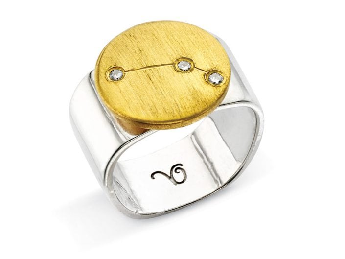 Ring of 22k gold disc atop a sterling silver band features glittering high-quality diamonds outlining star sign constellation of Aries.