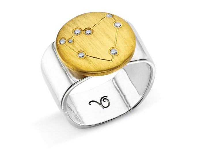Ring of 22k gold disc atop a sterling silver band features glittering high-quality diamonds outlining star sign constellation of Capricorn.