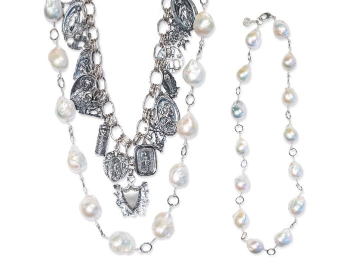 Wear this necklace in any of the 4 ways to fit your style. Large strand of pearls paired with sterling silver religious charms.