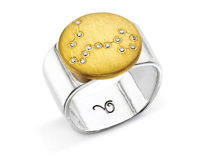 Ring of 22k gold disc atop a sterling silver band features glittering high-quality diamonds outlining star sign constellation of Pisces.