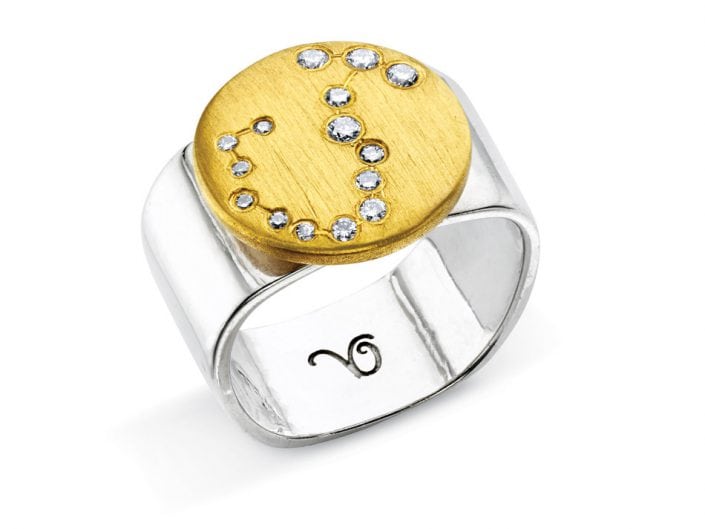 Ring of 22k gold disc atop a sterling silver band features glittering high-quality diamonds outlining star sign constellation of Scorpio.