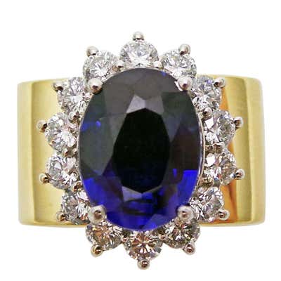 4.27 Carat Oval Sapphire and Diamond Halo Gold Cocktail Ring