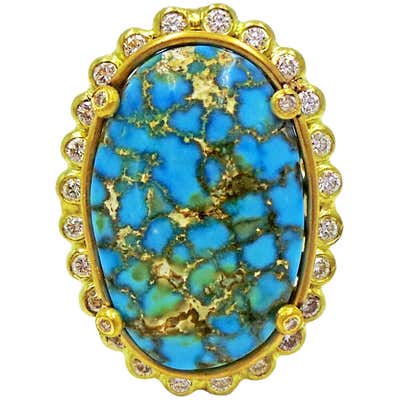 17.5 Carat Turquoise Mountain Gem and Diamond Halo Hand-Forged 22k Gold Ring